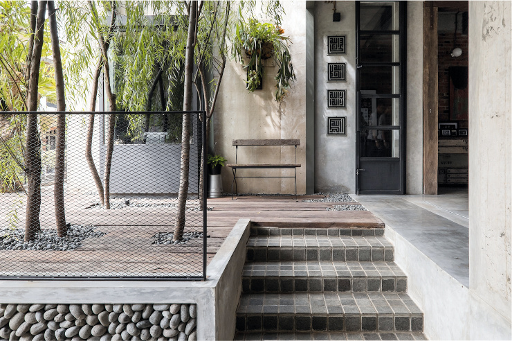 teras rumah minimalis dengan taman kering