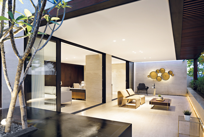 ruang santai dengan material travertine simple