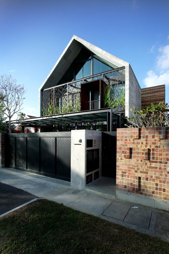 kombinasi pagar Batu bata ekspos dan besi