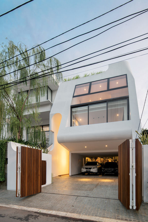 Fasad rumah gaya modern / Haliman House oleh W Office / William Sutanto